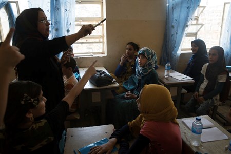 Schools in Iraq face desk deficit